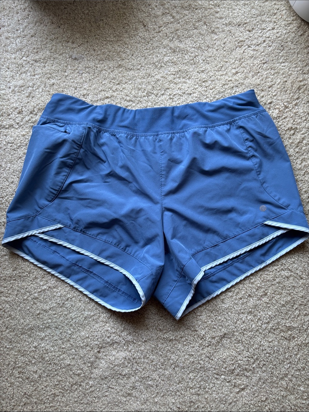 Apana Slate Blue Running Shorts with Contrast Trim and a zip pocket